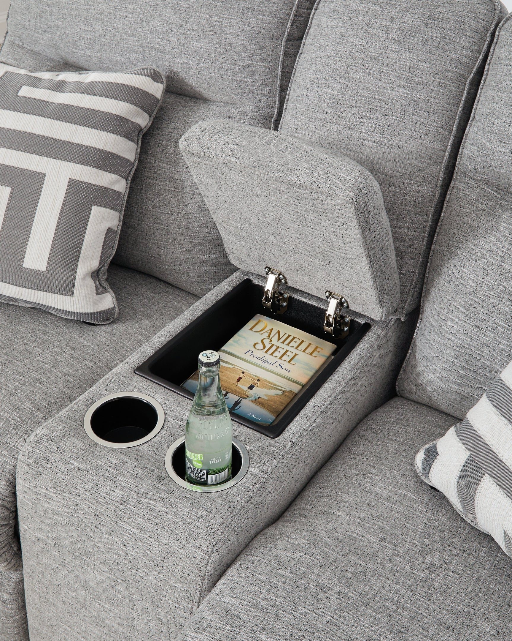 Center console with cup holders and hidden storage