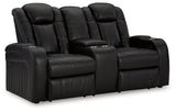 Side angle of Caveman Den Midnight Faux Leather Power Reclining Loveseat