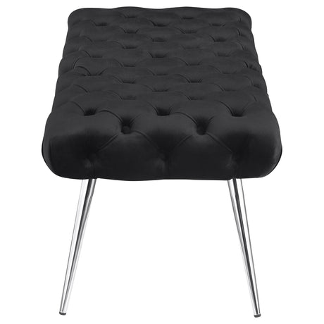 Close-up of stainless steel leg and upholstery