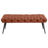 Close-up of rust fabric and button-tufting on Ella bench