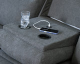 Close-up of drop-down table and cup holders