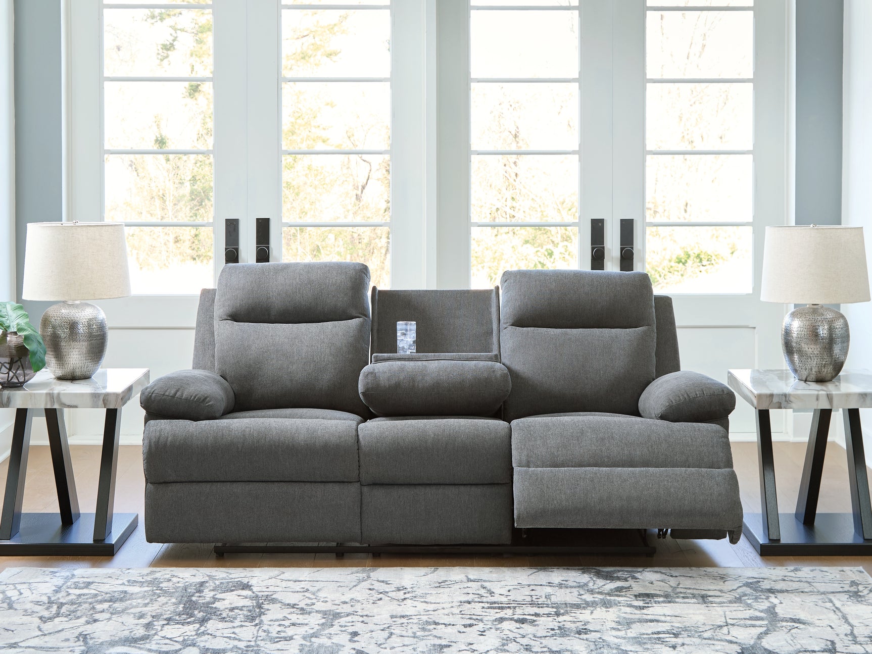Drop-down table with cup holders and USB charging port open