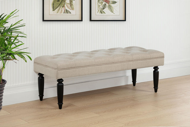 Marsha upholstered bench showing button tufted seat, angled view