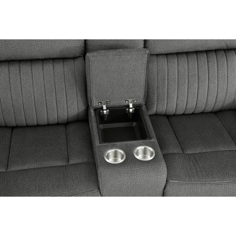 Close-up of nailhead trim on armrest
