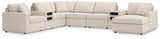room view highlighting spacious Modmax Oyster Nuvella® 8-Piece Sectional with chaise and integrated audio system