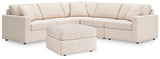 Side view showing sectional and ottoman in oyster color