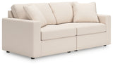 Angle side view of Modmax oyster loveseat