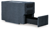 Open audio console compartment on sectional sofa