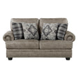 Gray tufted faux leather loveseat with pillows front view