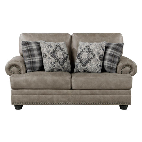 Gray tufted faux leather loveseat with pillows front view