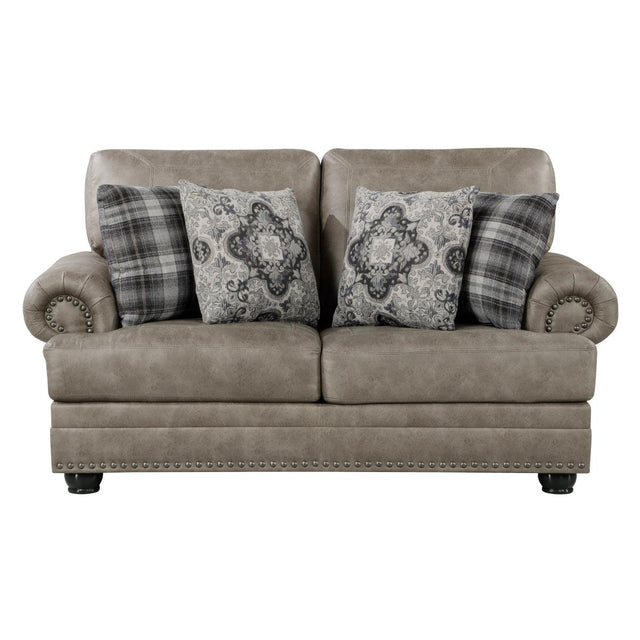 Gray tufted faux leather loveseat with pillows front view