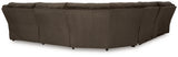 Close-up of console storage and cup holders in chocolate velvet sectional