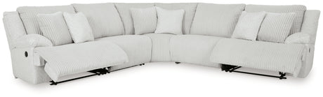 Open left-arm recliner pulled out showing footrest