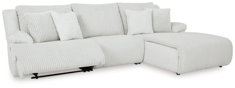 Close-up detail of velvet texture on sectional sofa chaise
