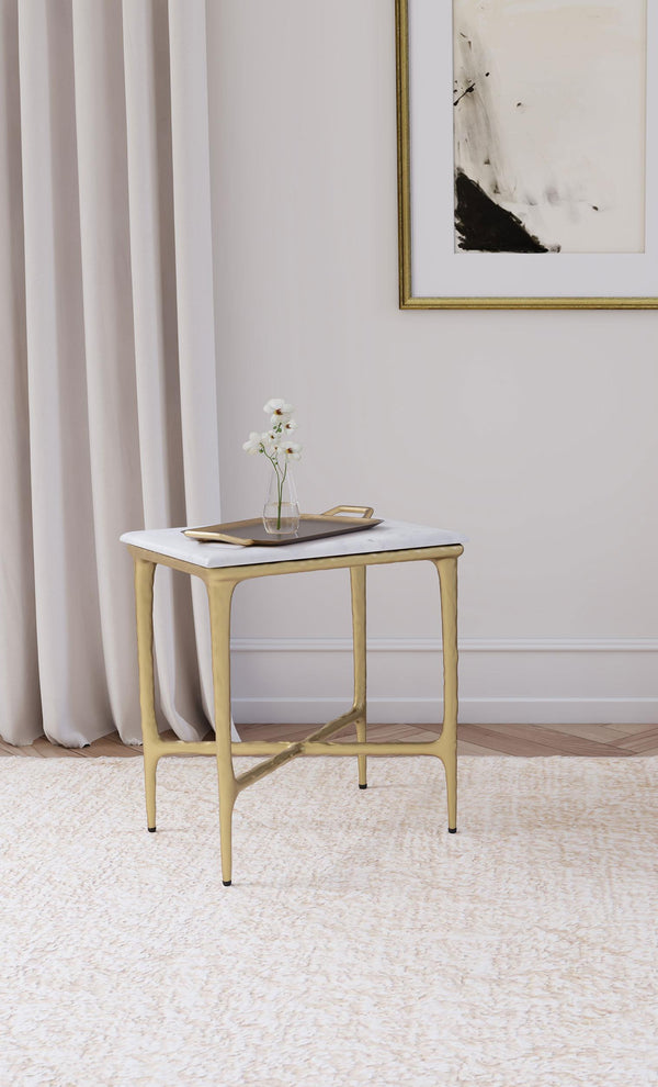 Close-up of gold marble tabletop with rounded edge