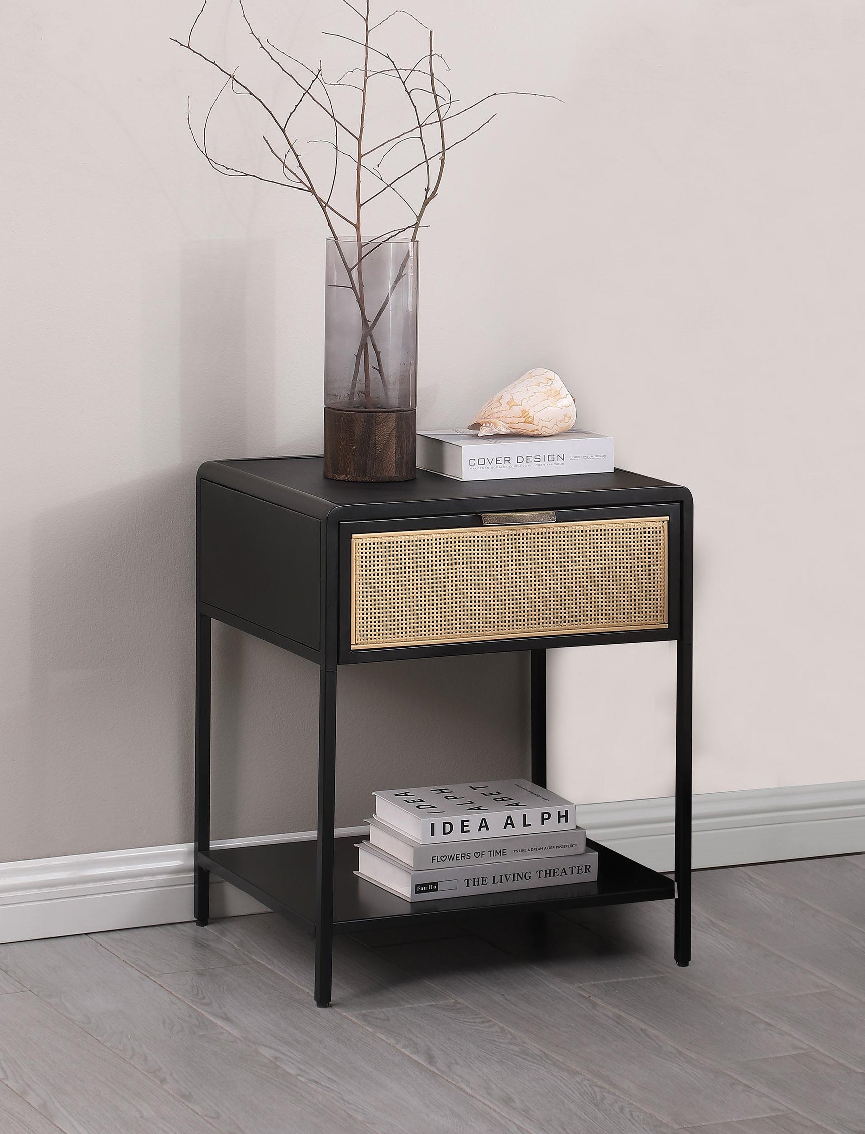 Amherst side table angled view highlighting rattan drawer