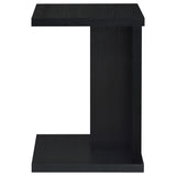 Empty black C-shaped sofa side table with plastic glide levelers