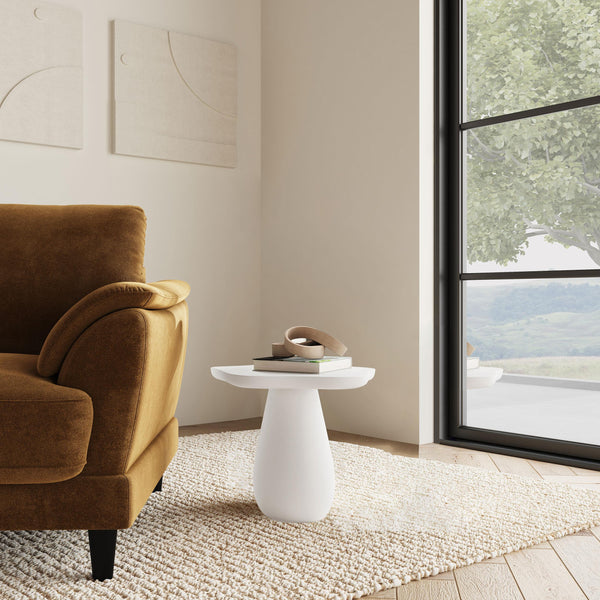 Side view of Perth 17-inch off-white cloud-shaped side table