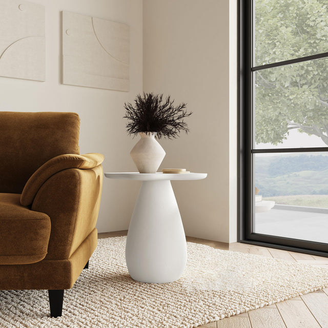 Side view of Perth cloud-shaped top side table in off-white finish
