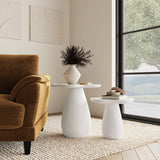 Perth side table with cloud-shaped top shown with decorative items