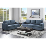 Elmont Blue Loveseat styled in modern living room setting
