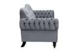 Side perspective of velvet loveseat