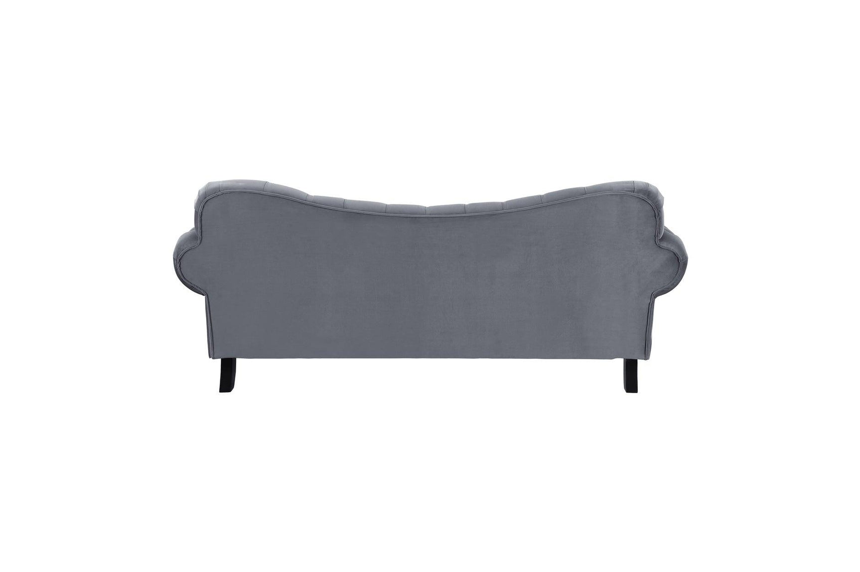 Side profile of velvet tufted loveseat