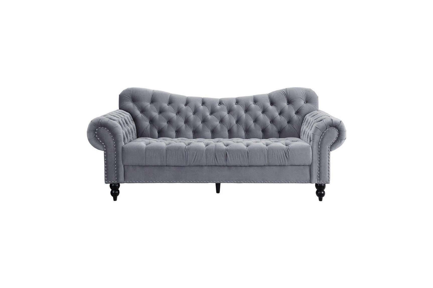 Close-up of velvet tufted sofa cushions