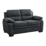 Holleman dark gray textured fabric loveseat side angle