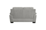 View of loveseat cushions and armrest