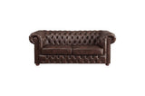 Close-up detail of tufted brown faux leather upholstery