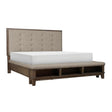 Gray tufted upholstered queen panel bed angled side view