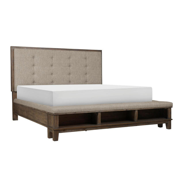 Gray tufted upholstered queen panel bed angled side view