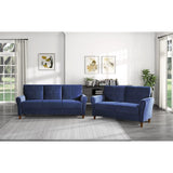 Side angle showing arm and seat of Dunleith blue velvet sofa
