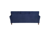 Side view of Dunleith blue velvet tufted loveseat