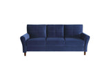 Close-up detail of Dunleith blue velvet tufted upholstery