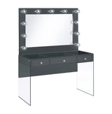 Close-up of three drawers with crystal knobs and tempered glass top