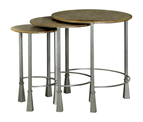 Detail of Deja 3-piece round nesting tables showing natural wood grain and industrial legs