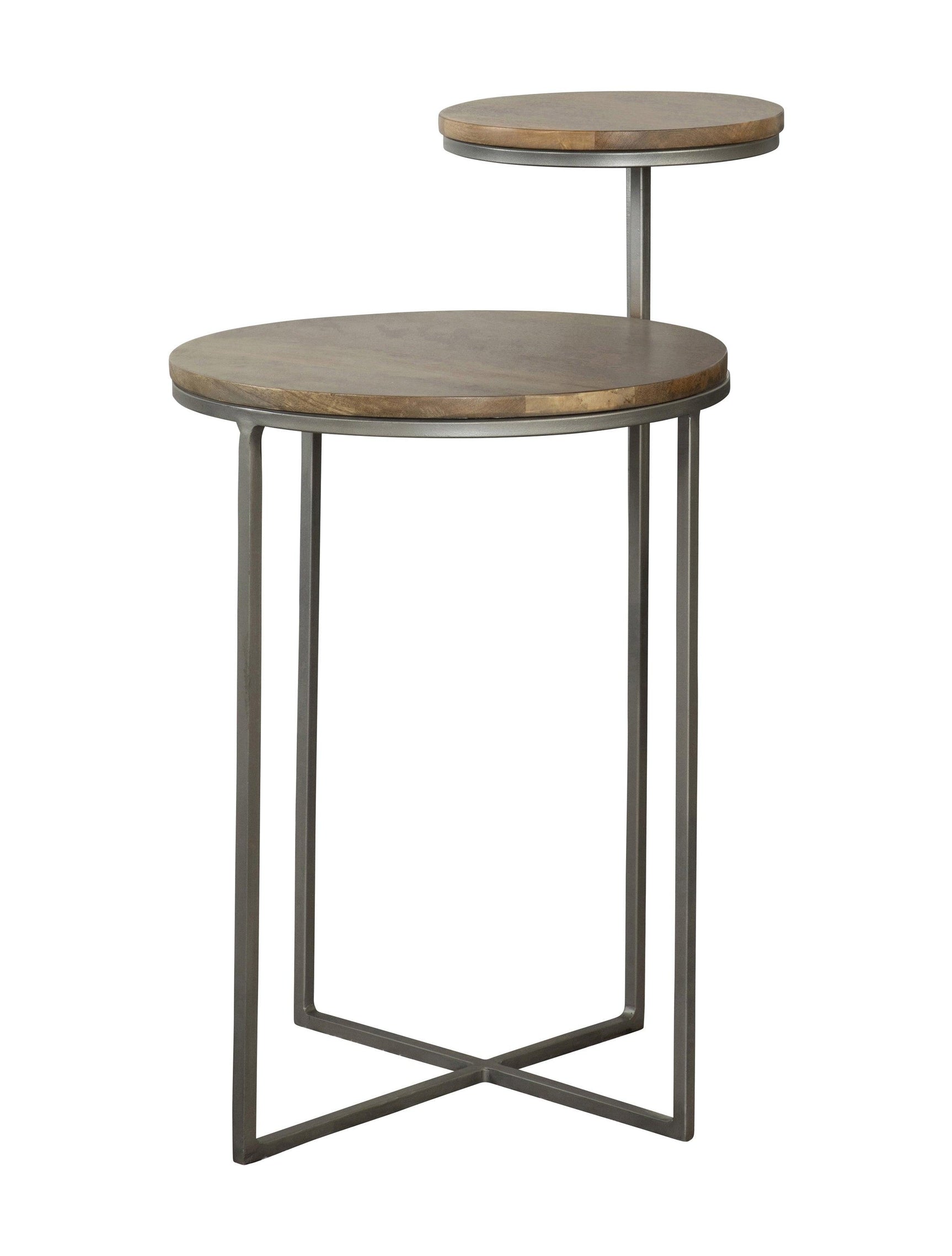 Close-up of Yael Round Accent Table’s natural mango wood tabletops with gunmetal metal frame