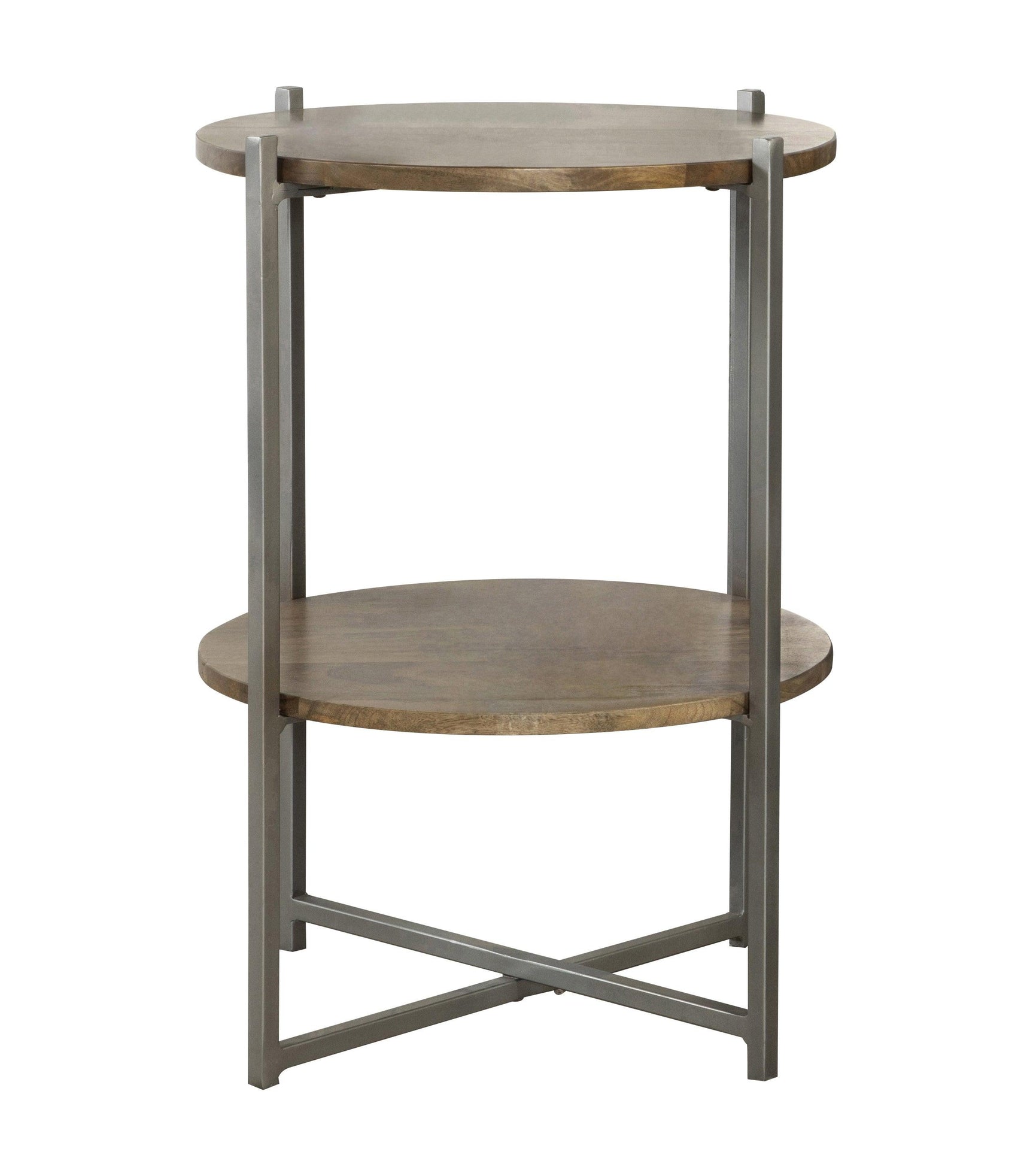 Side angle of Axel round accent table showing mango wood top and open bottom shelf