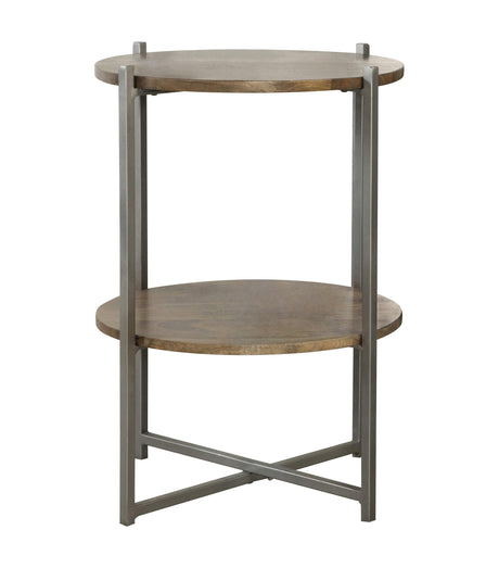 Side angle of Axel round accent table showing mango wood top and open bottom shelf
