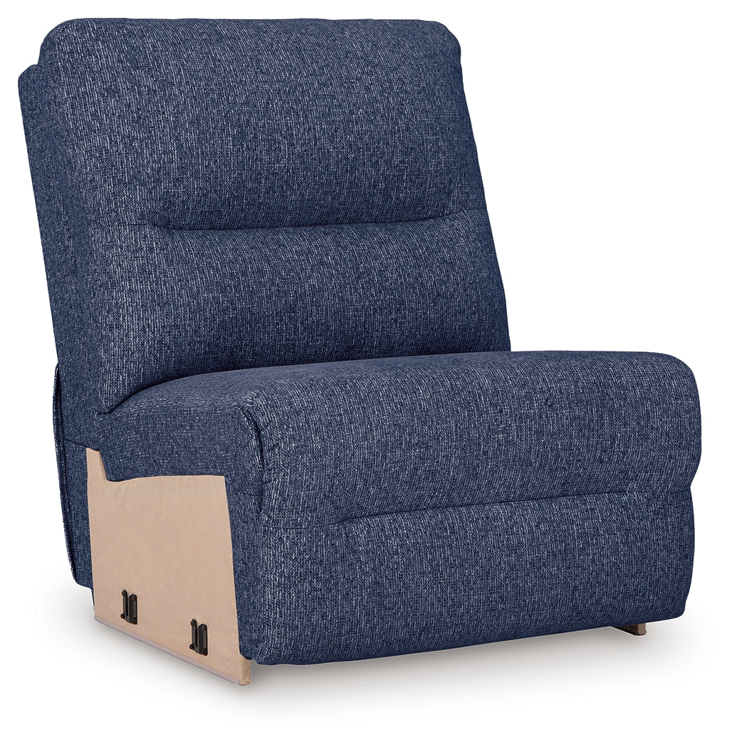 Detail of armrest and stitching on navy sectional