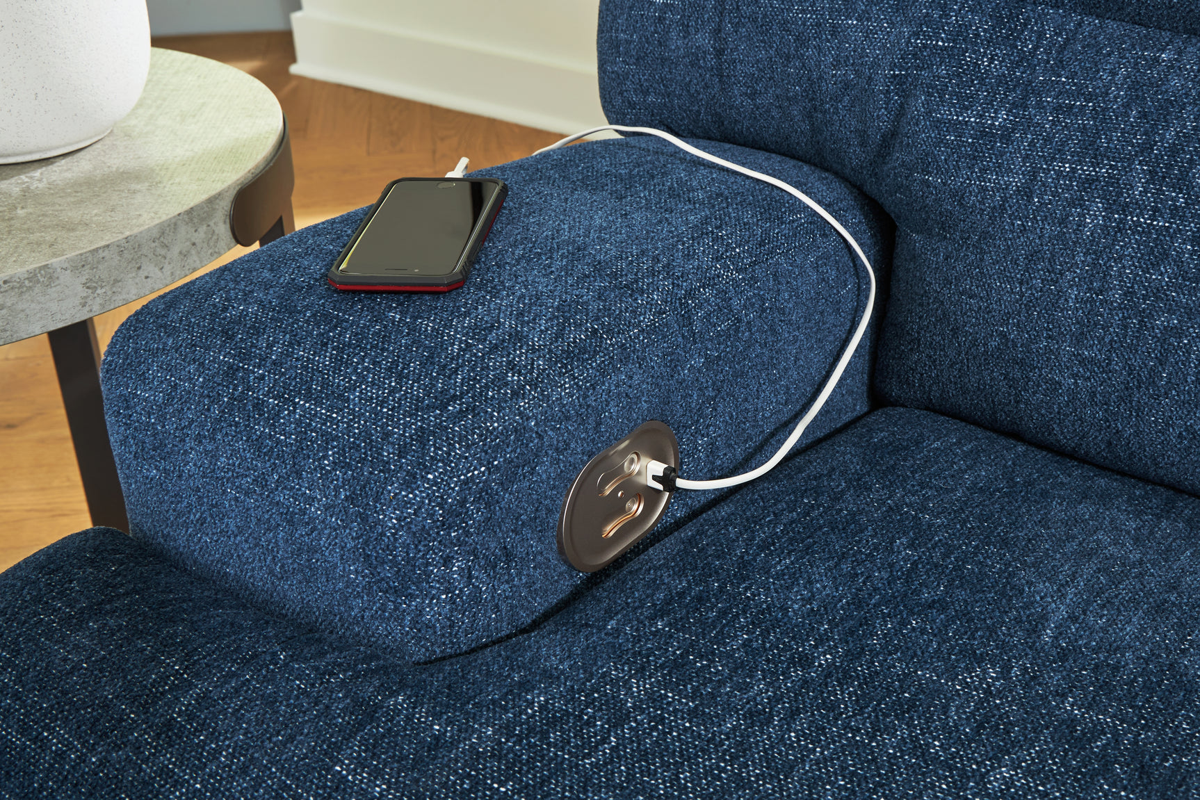 Close-up of USB charging port on Acklen Place sectional