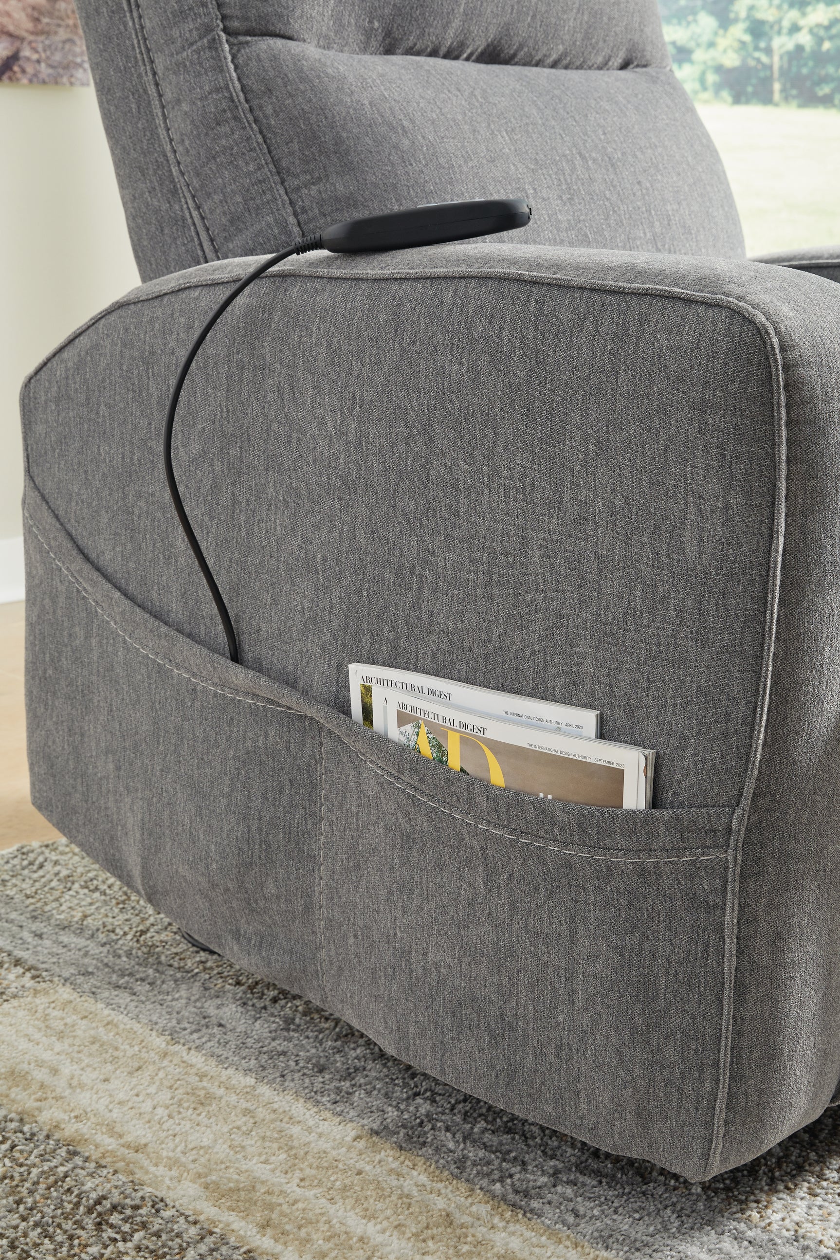 Close-up of side pocket on Starganza Gray Power Lift Recliner