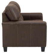 Side perspective of Navi Smoke Faux Leather Loveseat