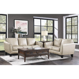 Morelia Beige Loveseat with nailhead trim detail