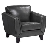 Side view of Spivey Dark Gray leather accent chair with contoured arms