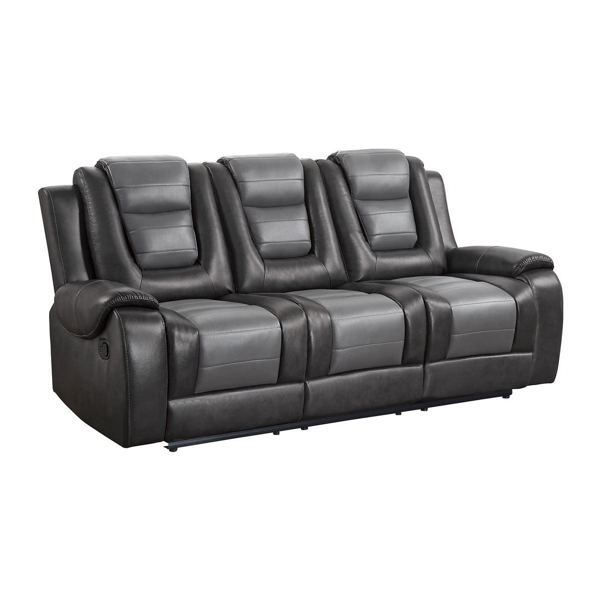 Side angle of Briscoe 2-Tone Gray Faux Leather Double Reclining Sofa