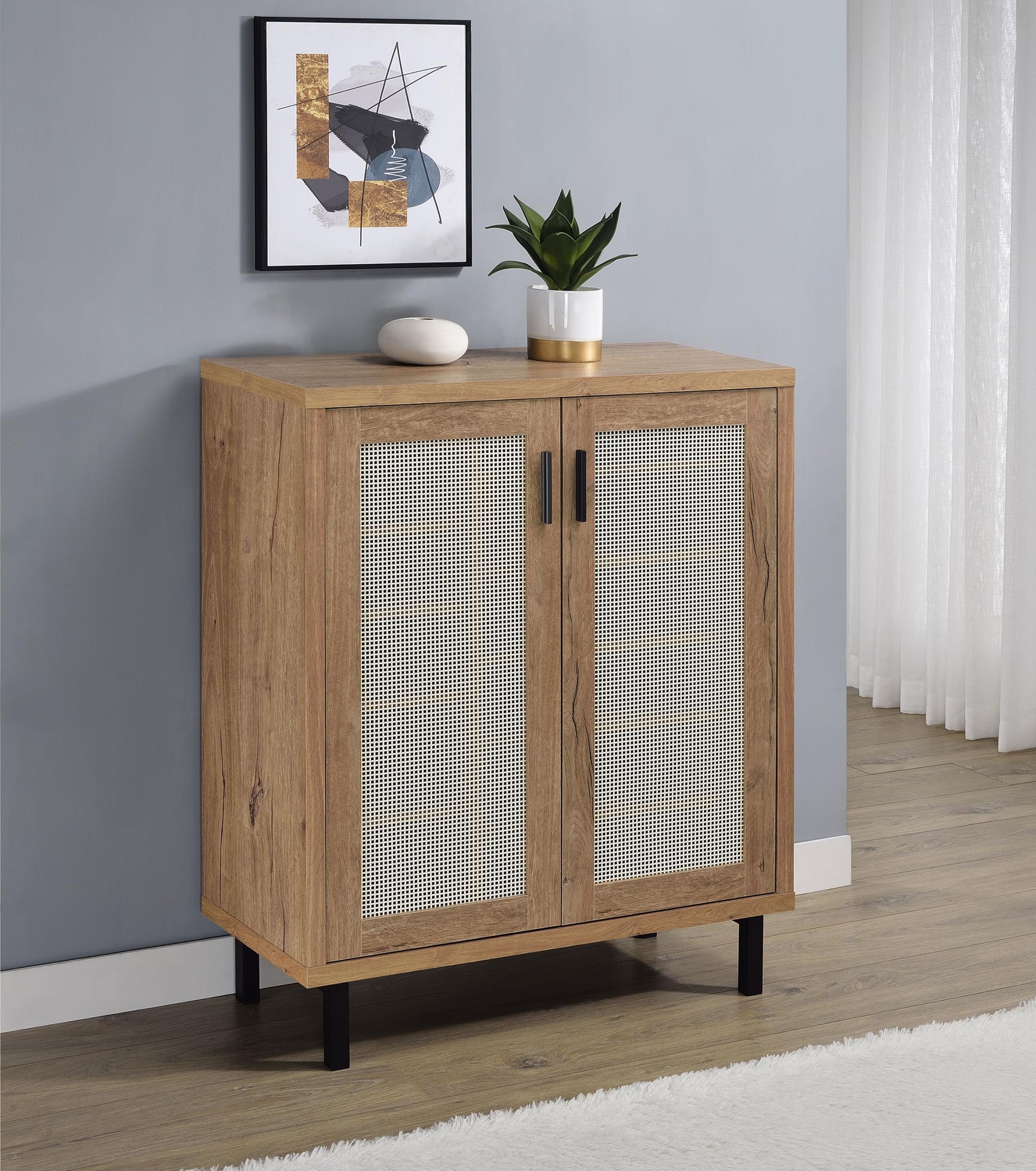 Side angle of Teller shoe storage cabinet highlighting black metal legs and mesh door detail