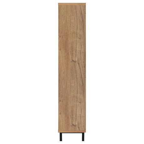 Black metal legs supporting the tall shoe cabinet